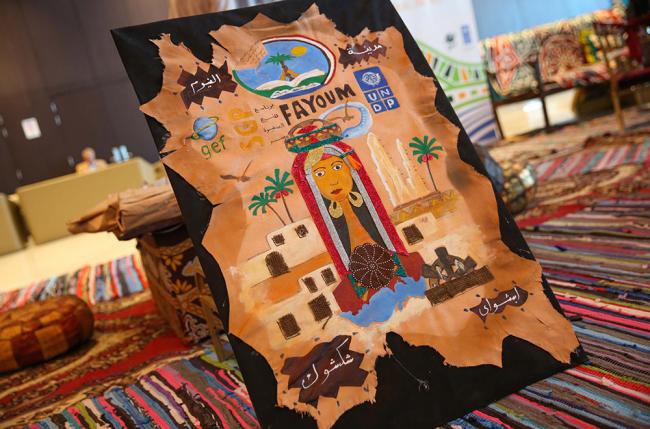 A painting made by an Egyptian artist showcasing efforts to engage with local communities to protect biodiversity.