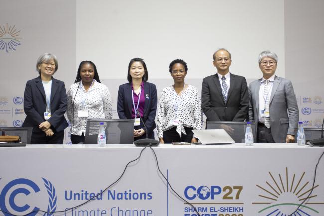 Panelist pose for a group picture