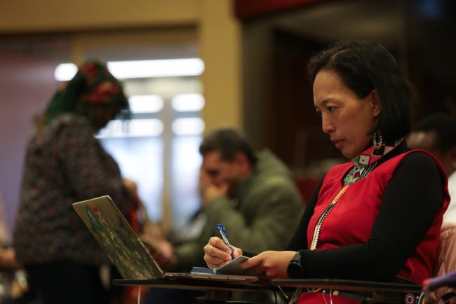 Delegate takes notes