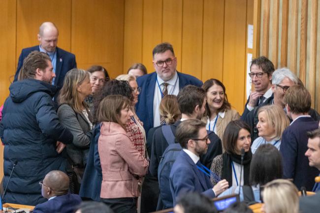 Huddle of delegates