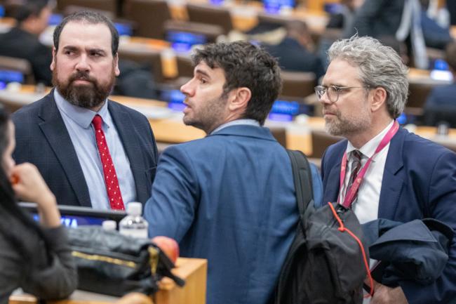 Huddle of delegates